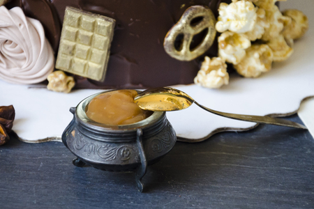 Chocolate cake and other sweets with salted caramel and birdâs milkの写真素材