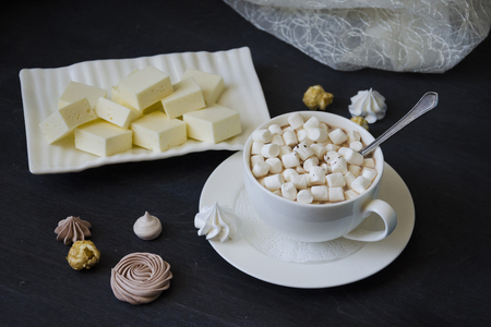 Chocolate cake and other sweets with salted caramel and birdâs milkの写真素材