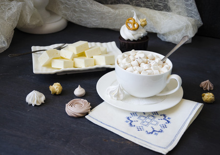 Chocolate cake and other sweets with salted caramel and birdâs milkの写真素材