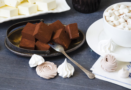 Chocolate cake and other sweets with salted caramel and birdâs milkの写真素材