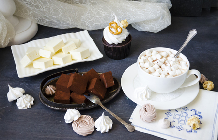 Chocolate cake and other sweets with salted caramel and birdâs milkの写真素材