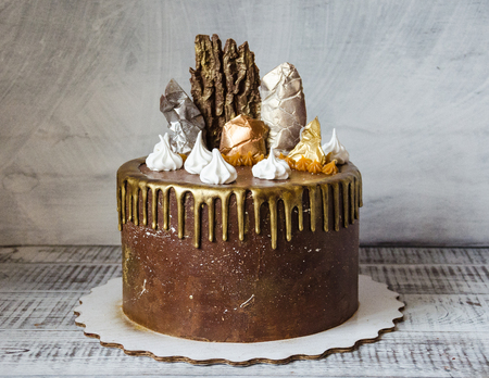Chocolate cake with salted caramel, sails and merengueの写真素材