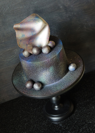 chocolate velvet cake with a sail and caramel spheresの写真素材