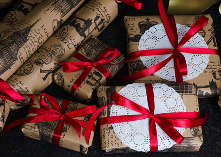 Christmas hand made present boxes decorated with lace and ribbonsの写真素材