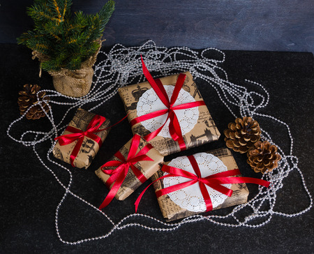 Christmas hand made present boxes decorated with lace and ribbonsの写真素材
