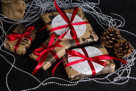 Christmas hand made present boxes decorated with lace and ribbonsの写真素材