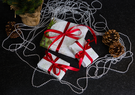 Christmas hand made present boxes decorated with lace and ribbonsの写真素材