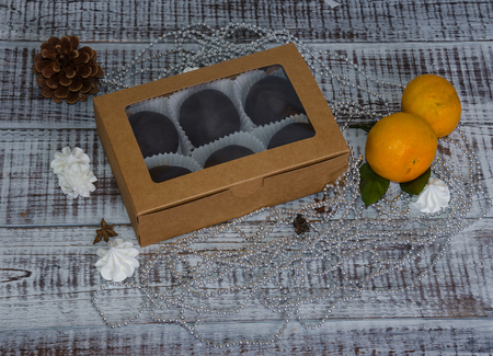New year chocolate potato cake on wooden backgroundの写真素材