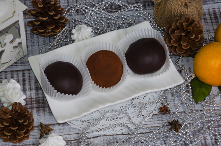 New year chocolate potato cake on wooden backgroundの写真素材
