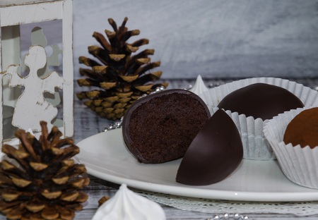 New year chocolate potato cake on wooden backgroundの写真素材