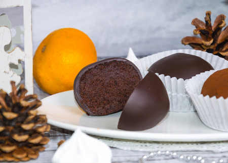 New year chocolate potato cake on wooden backgroundの写真素材