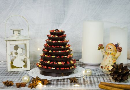 Christmas decoration set with candles, lights and firtreeの写真素材