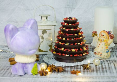 Christmas decoration set with candles, lights and firtreeの写真素材