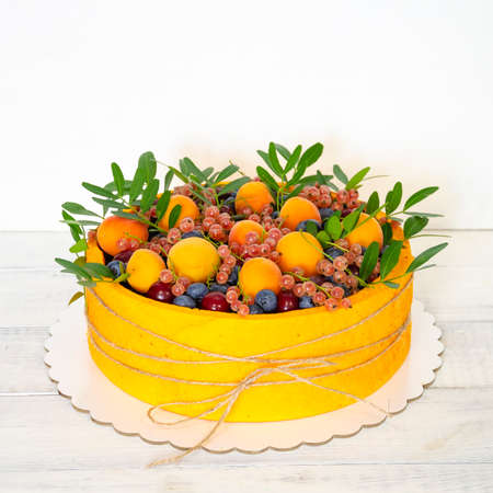 birthday anniversary velvet cake with fruits and berriesの写真素材