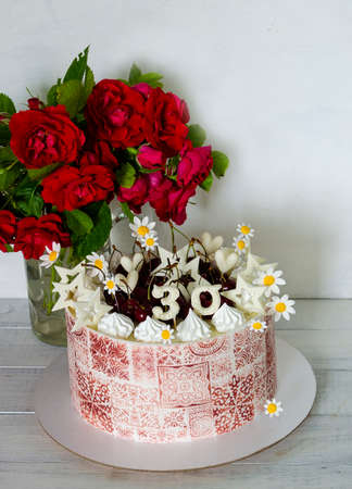Burgundy stencil cake with roses for 30th anniversaryの写真素材