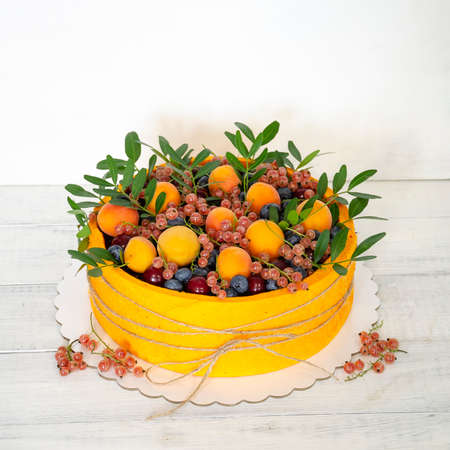 birthday anniversary velvet cake with fruits and berriesの写真素材