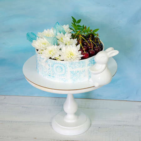 Best stencil cake with cherries and chrysanthemumの写真素材