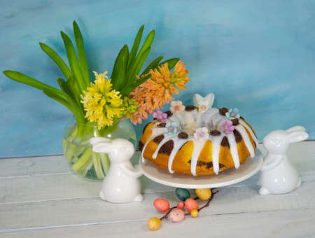 Easter cake holiday outlay with wooden decorationの写真素材