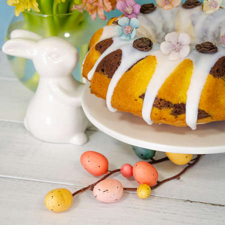 Easter cake holiday outlay with wooden decoration