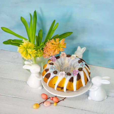 Easter cake holiday outlay with wooden decorationの写真素材
