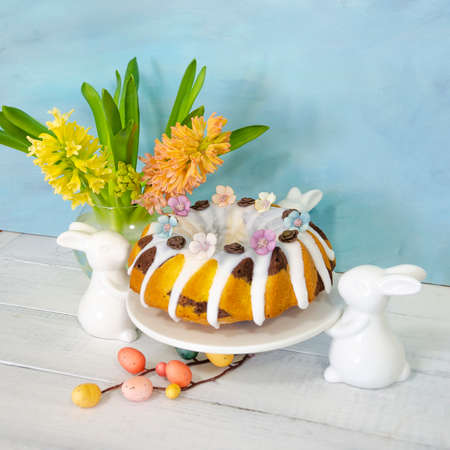 Easter cake holiday outlay with wooden decorationの写真素材