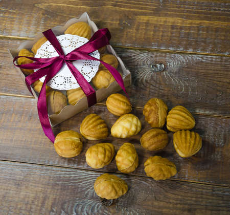 Retro sweets with caramel on wood in gift boxの写真素材