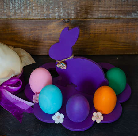 Easter cake holiday outlay with wooden decorationの写真素材