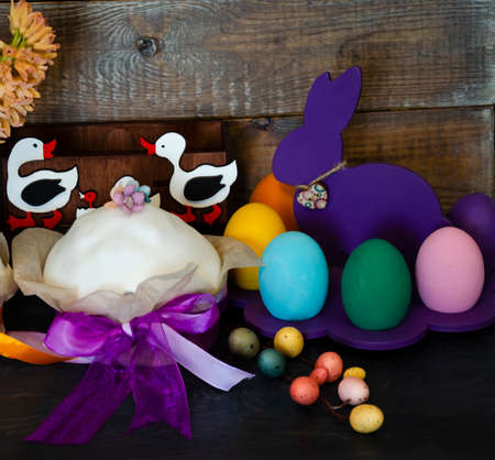 Easter cake holiday outlay with wooden decorationの写真素材