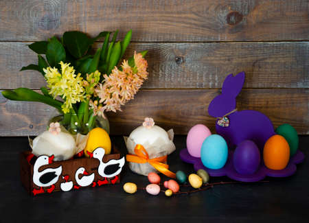 Easter cake holiday outlay with wooden decorationの写真素材