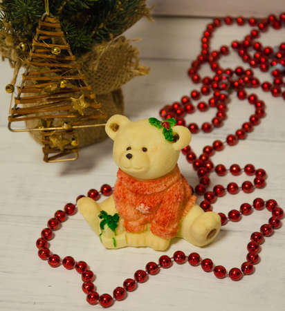 Chocolate Christmas teddy bear with fir tree and other decorationの写真素材