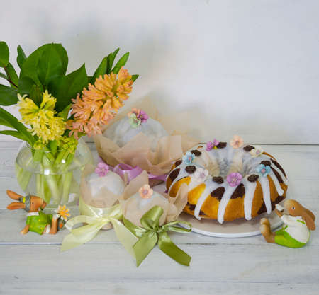 Easter cake holiday outlay with wooden decorationの写真素材