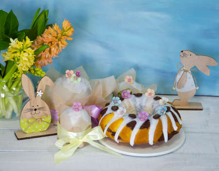 Easter cake holiday outlay with wooden decorationの写真素材