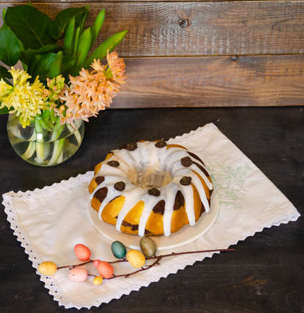 Easter cake holiday outlay with wooden decoration