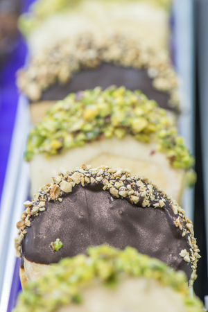 cookies ice cream with chocolate and nuts in seriesの写真素材