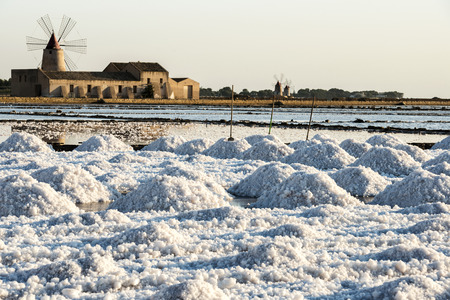 Pans of Trapani with windmills, in Sicilyの写真素材