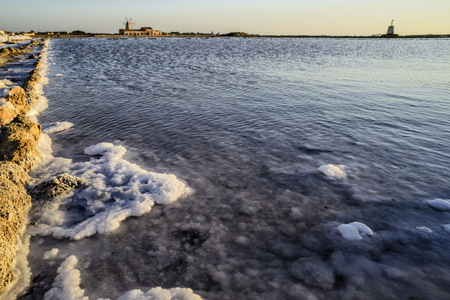 Pans of Trapani with windmills, in Sicilyの写真素材