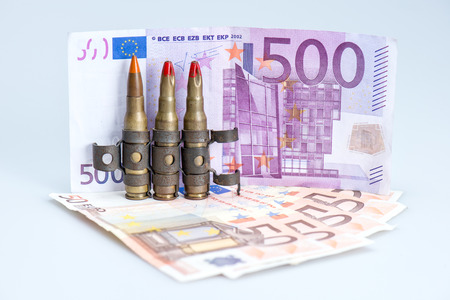 small vest rifle bullets with euro notesの写真素材
