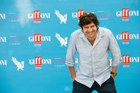 GIFFONI VALLE PIANA (SA) - JULY 18: Actor Fabio De Luigi poses at photocall during the 45th Giffoni Film Festival at Cittadella del Cinema, July 18, 2015 in Salerno, Italy.のeditorial素材