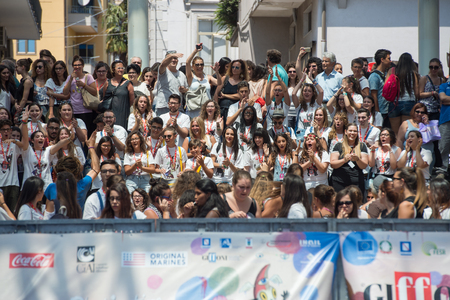 Giffoni Valle Piana, SA, ITALY - July 21, 2016: boys waiting for the actors to the blue carpet at Giffoni Film Festival 2016 - on July 21, 2016 in Giffoni Valle Piana, Italy.のeditorial素材