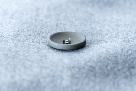 special buttons on the gray coat