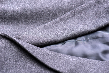 Particular pocket on the gray coatの写真素材