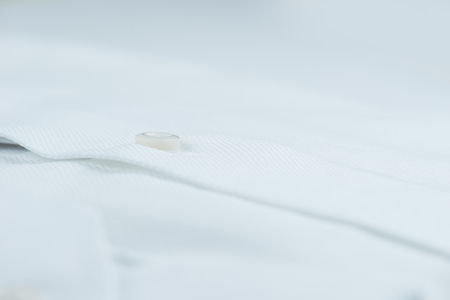 details of white shirt with background white