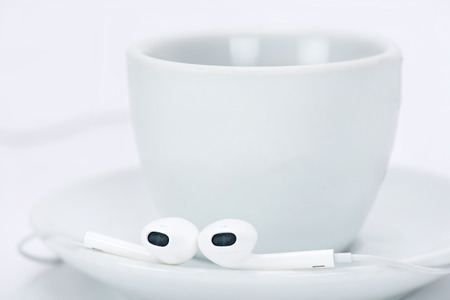 Cup of the with headphone, in studio.の写真素材