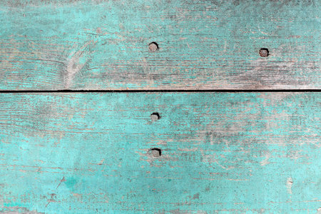 Wooden planks in the old blue paintの写真素材
