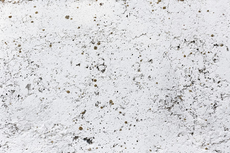 Texture of a white wall. An old white wall.の写真素材