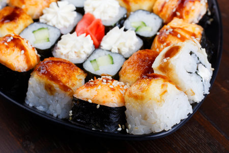 Beautiful sushi close up. Different sushi and rolls. Selective focus.の写真素材