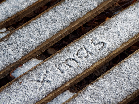 The inscription xmas on the snow. Beautiful Christmas background.の写真素材
