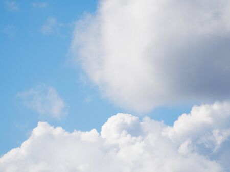 Blue sky with beautiful cumulus clouds. Sunny weather before the rain.の写真素材