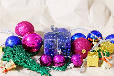 Multi-colored Christmas toys on craft paper. New Years toys.の写真素材