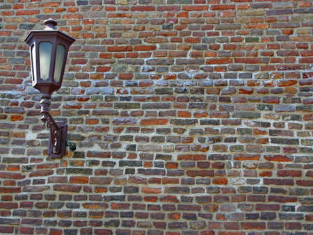 Brick wall with lanternの写真素材